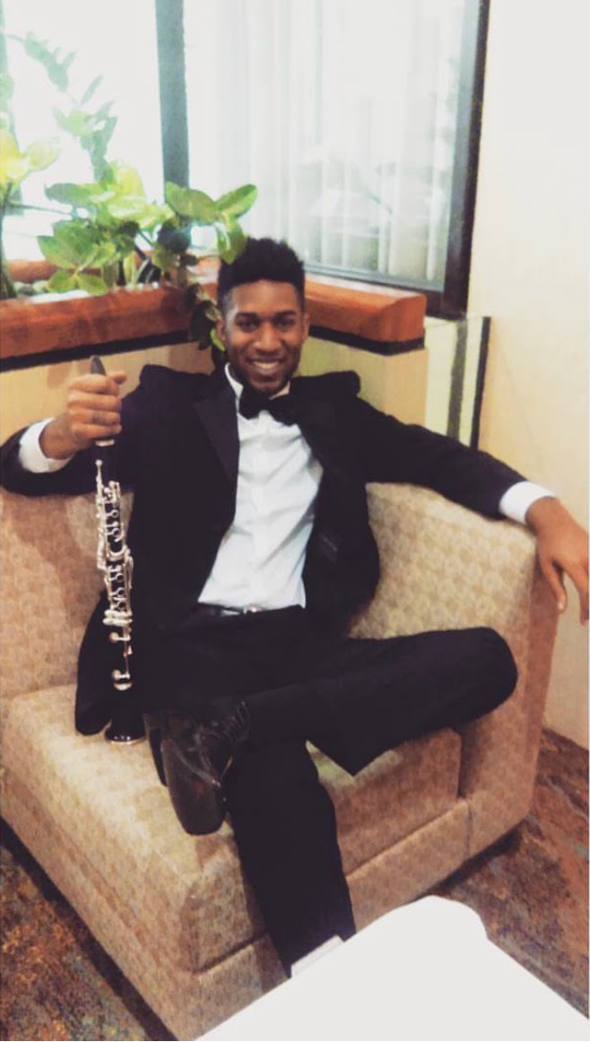 Kalif Wilkes in tuxedo with clarinet